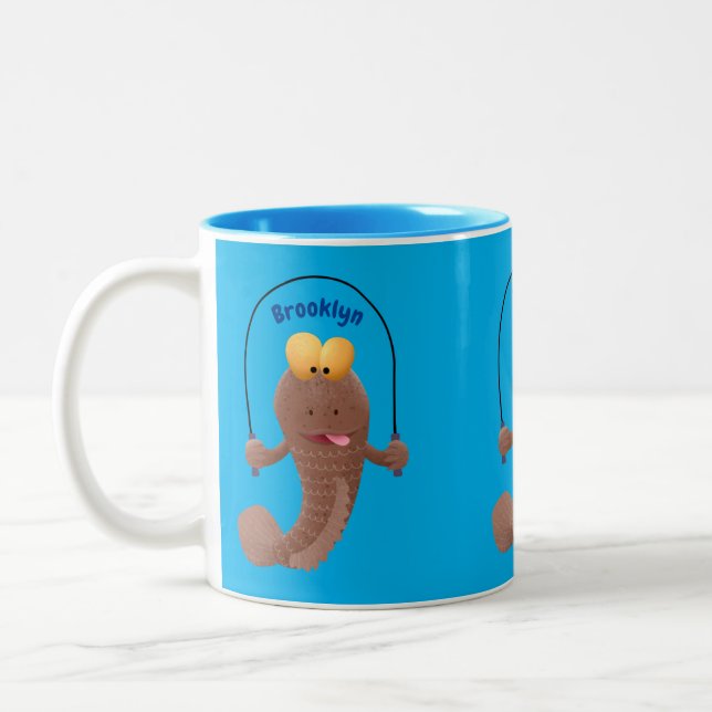 Funny skipping mudskipper fish cartoon  Two-Tone coffee mug (Left)