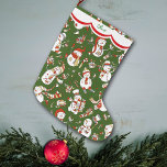 Funny Snowman Pattern on Green Large Christmas Stocking<br><div class="desc">This cute Holiday stocking has images of cartoon snowmen in various activities, including skiing, skating, and shopping for Christmas. The images are primarily in black, red, blue, and gold, and placed on a Christmas green background. A white scalloped edge design bordered in red holds your customized name at the top....</div>