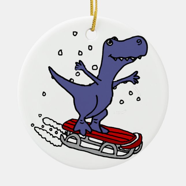 Funny T-rex Dinosaur Sledding Cartoon Ceramic Ornament (Front)