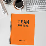 Funny Team Personalized Notes Office Meeting Notebook<br><div class="desc">Funny Team Personalized Notes Office Meeting Notebook features the text "Team Awesome" with your personalized name below on an orange background. Personalize by editing the text in the text box provided. Designed for you by ©Evco Studio www.zazzle.com/store/evcostudio</div>