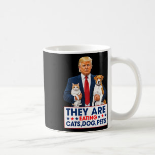Funny They Are Eating The Dogs The Cats The Pets Coffee Mug
