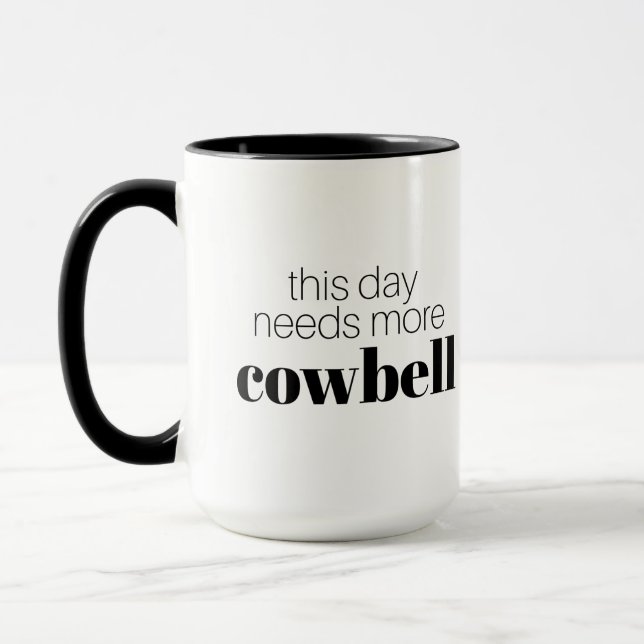 Funny This Day Needs More Cowbell Mug (Left)