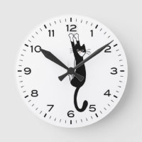 Funny Tuxedo Cat Hanging On Black and White