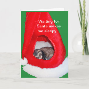 Furet dans la carte de Noël de casquette de Père
