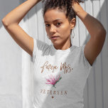 Future Mrs floral typography script team bride T-Shirt<br><div class="desc">Glam elegant floral custom future Mrs t-shirt with copper glitter brushed handwritten like typography script, a pink blush watercolor magnolia flower, and a small heart. Easy to personalize with bride's to be future name. Suitable for spring or summer trendy modern glamourous wedding bridal team bride or bachelorette parties or as...</div>