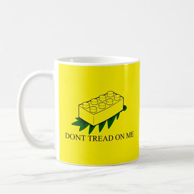 Fuzzy Express® Gadsden Flag Brick Joke Yellow Coffee Mug (Left)