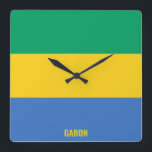 Gabon National Flag Patriotic Square Wall Clock<br><div class="desc">Gabon National Flag Patriotic Square Wall Clock with the country flag in the national colours printed all over the clock. Country name is subtly integrated in the design on the bottom. Text is fully customizable using "Customize it!" feature. This charming design is the stunning gift and the great show piece...</div>