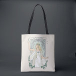 Galadriel Light of Valinor Graphic Tote Bag<br><div class="desc">Step into the radiant grace of Middle-Earth™ with this exquisite Lord of the Rings™ design inspired by Galadriel™. Illustrated in an elegant, Art Nouveau–inspired style, she stands poised and luminous, holding a phial of the Light of Valinor with serene strength and quiet authority. Flowing golden hair, delicate Elven adornments, and...</div>