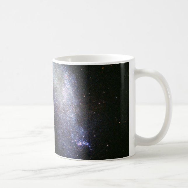 Galaxy NGC 1427A Plunges Toward the Fornax Galaxy Coffee Mug (Right)