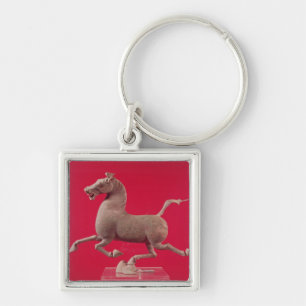 Galloping horse with one Hoof Resting on a Keychain