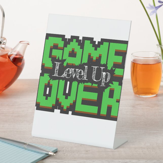 Game Over, Level Up: Pixelated Retro Game World Pedestal Sign (In SItu)