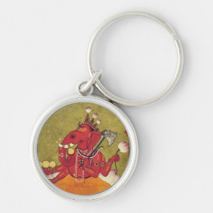 Ganesha about to throw his lotus keychain