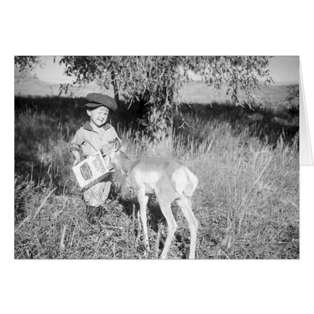 Garçon nourrissant l'antilope à la main (Devant horizontal)