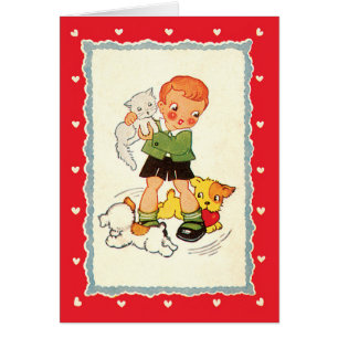 Garçon vintage tenant un chaton avec des chiots de