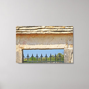 Gate and key stone carved with Montrachet, Canvas Print