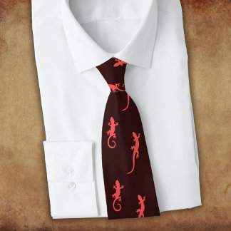Geckos in red climbing up (on dark) tie