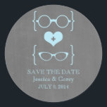 Geeky Glasses Chalkboard Save the Date Stickers<br><div class="desc">Quirky and chic Geeky Glasses Chalkboard Save the Date Stickers in light blue featuring a cute heart flanked by two pairs of nerdy eyeglasses, a manly pair and a girly pair representing the groom and bride on a chalkboard look background. These offbeat save the date stickers are perfect for announcing...</div>