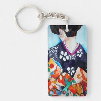 Geisha avec kimono bleu foncé et orange