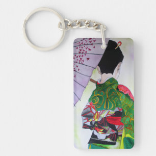 Geisha avec kimono vert et parapluie violet