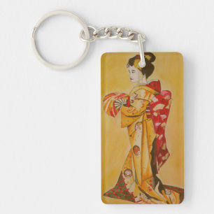 Geisha japonais en kimono rouge et or
