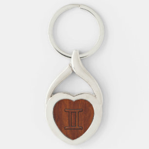 Gemini Zodiac Symbol on Mahogany like Decor Keychain