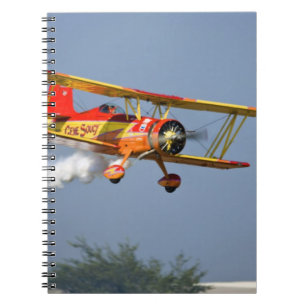 Gene Soucy performing aerobatics in Grumman Notebook