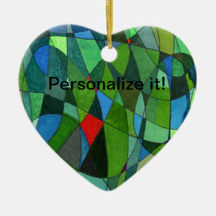 Gently curved shapes in cool greens & red accents ceramic ornament