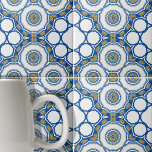 Geometric Blue and White Moroccan Azulejos Tile<br><div class="desc">This ceramic tile features a harmonious blend of geometric and floral elements. The tile is adorned with a series of concentric circles, each layer boasting a different pattern and shade, creating a mesmerizing visual effect. The outermost layer is characterized by bold blue outlines that form hexagonal shapes. These hexagons encapsulate...</div>