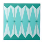 Geometric Diamonds & Starbursts Ceramic Tile<br><div class="desc">This Geometric Diamonds & Starbursts Small Ceramic Tile (large print) has all of the kitschy charm of something that is kitschy and charming. The vintage inspired design features a mod, peacock blue background with light blue, elongated hexagons, layered with turquoise diamonds, and peacock blue starbursts. It’s a kaleidoscope of retro...</div>