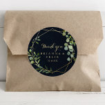 Geometric Gold Blue Green Thank You Wedding Favour Classic Round Sticker<br><div class="desc">This geometric gold blue green thank you wedding favour classic round sticker is perfect for a simple wedding. The design features hand-painted beautiful green leaves in a dark blue background, adorning a gold geometric frame. Make the sticker labels your own by including your names, the event (if applicable), and the...</div>