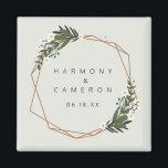 Geometric Gold Boho Greenery Wedding Favor Magnet<br><div class="desc">Modern boho wedding favor magnet with your names and date inside of a gold geometric frame surrounded by greenery and white flowers. A botanical design that is perfect for a bohemian celebration in the summer. These custom magnets makes great wedding favors your guests will want to keep. Frame courtesy of:...</div>