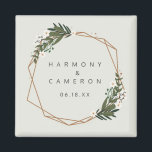 Geometric Gold Boho Greenery Wedding Favor Magnet<br><div class="desc">Modern boho wedding favor magnet with your names and date inside of a gold geometric frame surrounded by greenery and white flowers. A botanical design that is perfect for a bohemian celebration in the summer. These custom magnets makes great wedding favors your guests will want to keep. Frame courtesy of:...</div>
