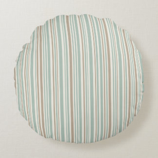 Geometric pattern of brown and green lines round pillow