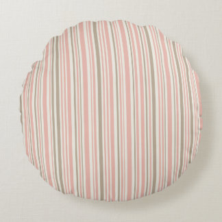 Geometric pattern of pink and brown lines round pillow