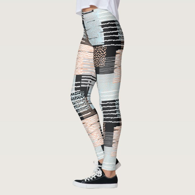 Geometric shapes and stripes leggings (Left)
