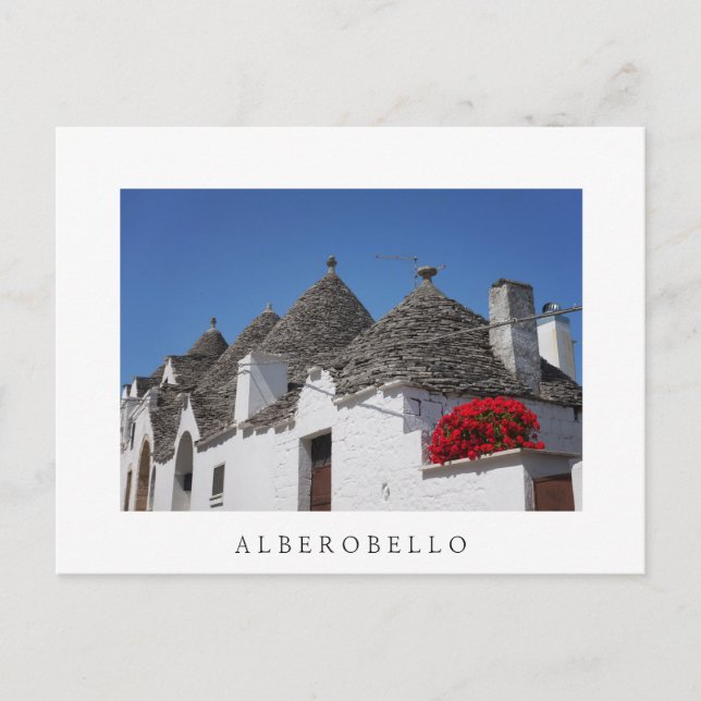Geranium flowers and trulli houses in Alberobello Postcard (Front)