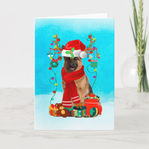 German Shepherd in snow with Christmas gifts  Card
