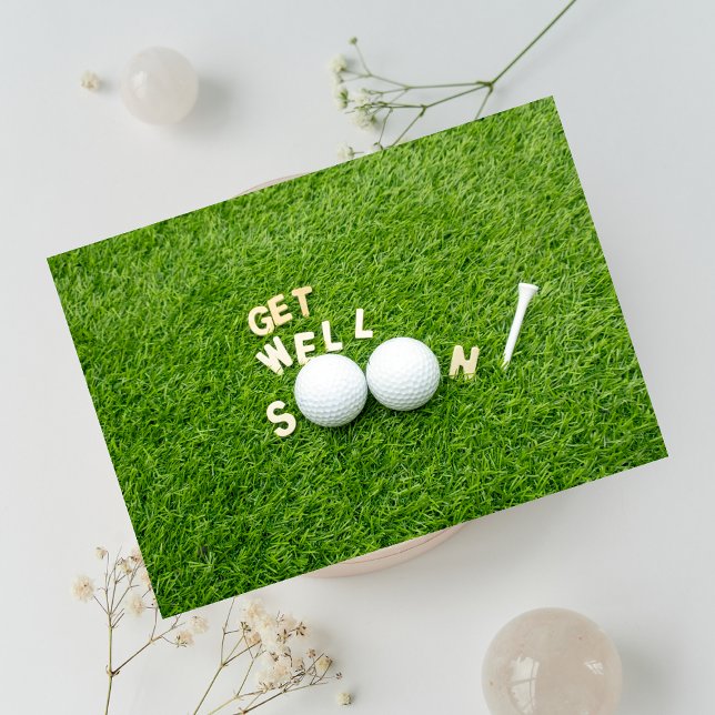 Get well soon with two golf balls and tee on green card (Creator Uploaded)