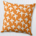 Ghost Halloween Orange Throw Pillow<br><div class="desc">Lots of little white ghosts on an orange background. A fun pattern for those who like cute and spooky things. Particularly good for Halloween. Original art by Nic Squirrell.</div>