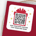 Gift box with faux golden stars QR code Christmas Square Sticker<br><div class="desc">Business QR code stickers featuring your QR code on a red (or custom colour) gift box silhouette surrounded by golden gradient (printed colour image,  not real foil) stars. Text,  font and colours are customizable. Perfect for directing your customer to a gift or freebie.</div>