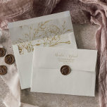 Gilded Floral | Cream and Gold Wedding Invitation Envelope<br><div class="desc">These gilded floral cream and gold wedding invitation envelopes are perfect for an elegant wedding. The design on the envelope liner features a whimsical arrangement of faux gold foil hand drawn flowers, leaves and botanicals. Personalize the envelope flap with your return address. These envelopes can also be used for a...</div>