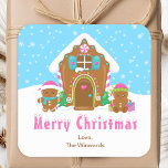 Gingerbread House Blue and Pink Merry Christmas Square Sticker<br><div class="desc">This cute and festive Merry Christmas sticker can be personalized with a name, relation or title. It features a cute gingerbread house decorated with pink and green candy. Beside it are adorable gingerbread men with gifts, dressed in Santa hats and a scarf. In the background is a bright blue winter...</div>