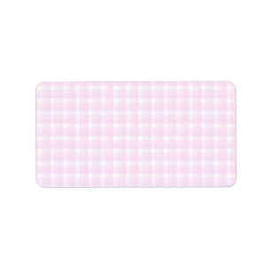 Gingham check pattern. Pale pink and white. Label