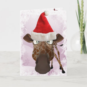 Girafe drôle avec la carte de Noël de casquette de