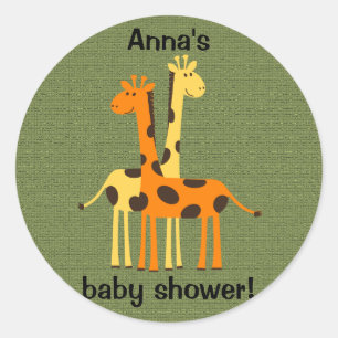 Girafes orange et jaune sur un autocollant vert