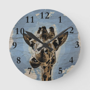 Giraffe chewing round clock