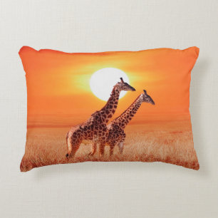 Giraffe in the African savanna against the backdro Accent Pillow