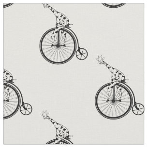 Giraffe riding a penny farthing bike fabric