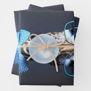 Giraffe wearing glasses, bow tie blowing blue gum wrapping paper sheet