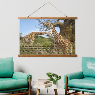 Giraffes out in the field by some trees poster hanging tapestry